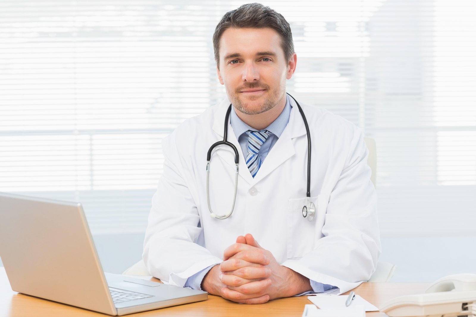Healthcare professional at a desk